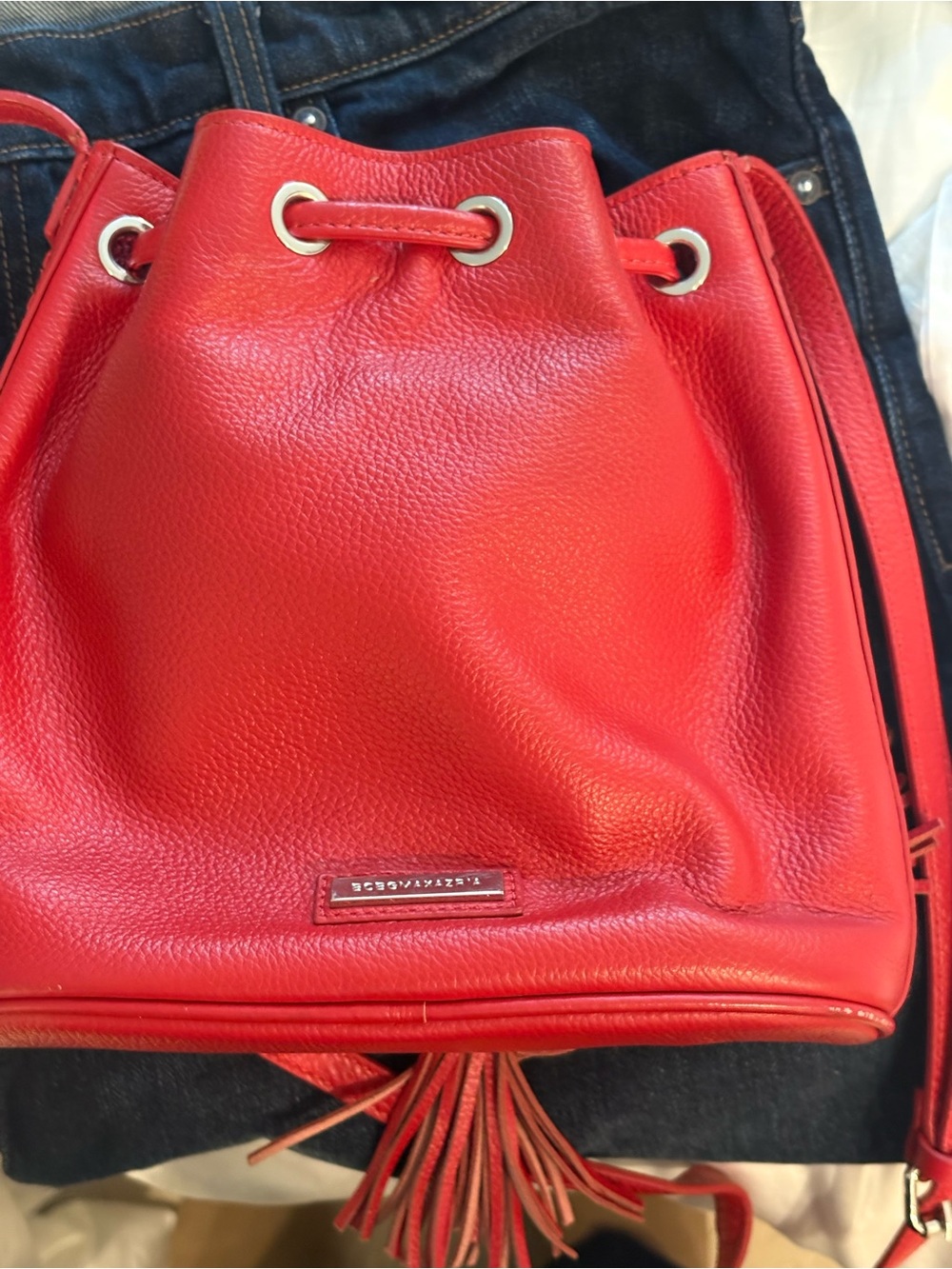BCBG Red Pebbled Leather Drawstring Bucket Bag with Tassels